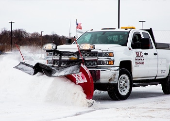 Scott's Lawn Care snow plowing truck